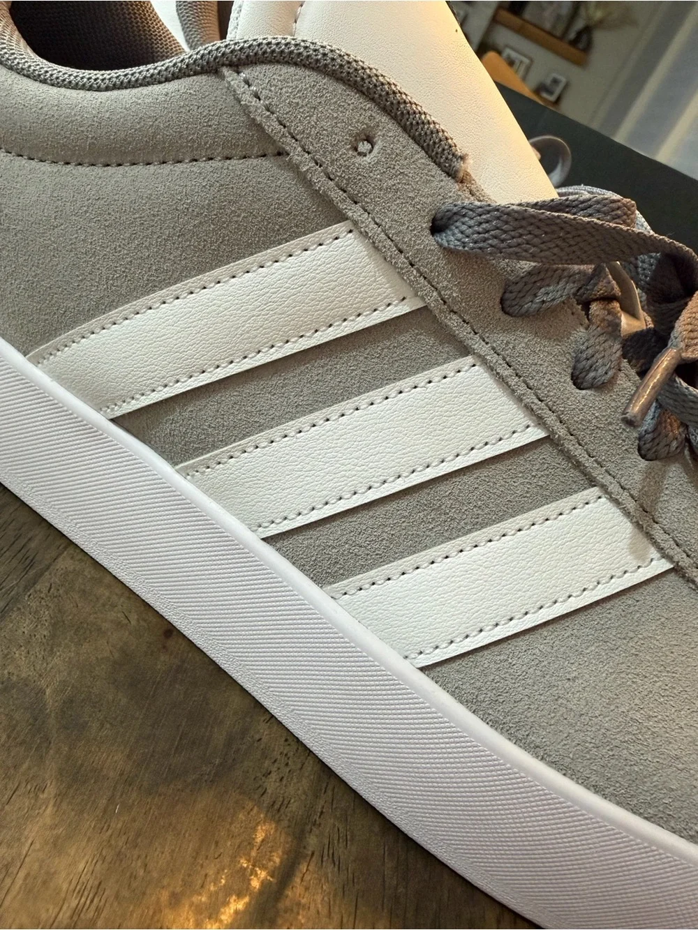 adidas men’s Gray and White Suede Low-Top Sneakers